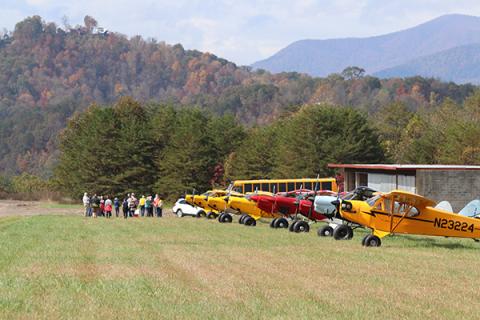 The club planes with the mountains in the background