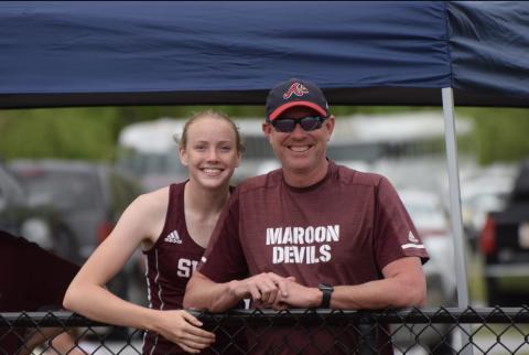 Jenna and Jeff Marr at a track meet where Jenna ran