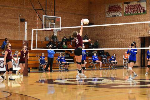 Lady Devil 8 at the net. The team is on hold now due to positive COVID-19 test and contact tracing