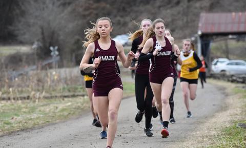 Lady Devils Gracie Monteith and Emily Ulaner were among the top two runners in the recent meet Dec. 30 at Kituwah Mound. 