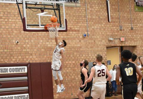 Maroon Devil Judaiah Littlejohn makes a lay up in the home loss against Hayesville. 