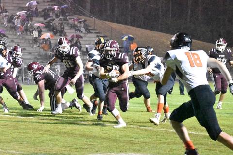 Andrew Chavez runs the ball downfield
