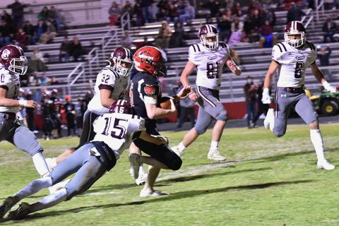 Maroon Devil Cooper Hyatt makes a tackle in the Andrews game