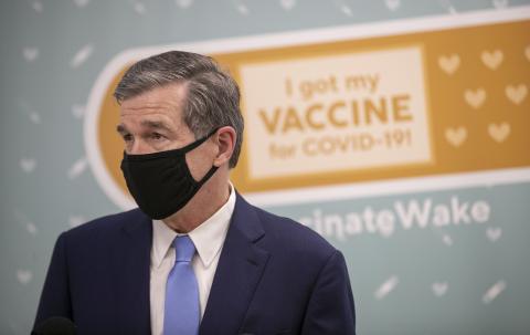 Gov. Roy Cooper visited Wake County’s Human Services Center in Raleigh to see people receive their vaccines.