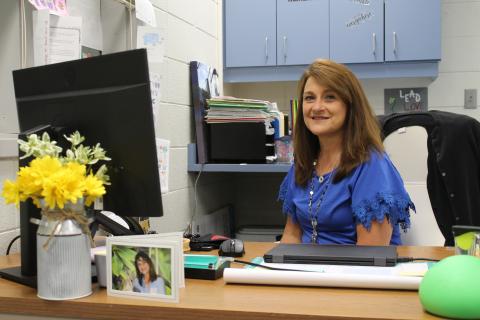 Lisa Sutton at her desk
