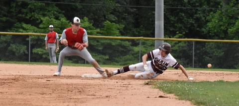 Maroon Devil Cooper Hyatt, junior, slides safely to base in the home win over Andrews Friday night. 