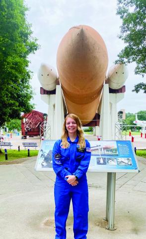 Kierra Shook is pictured at the U.S. Space and Rocket Center in Huntsville, Alabama, in her very own flight suit with her name on it.