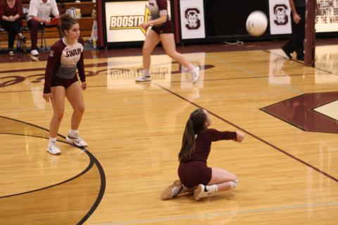 Freshman Kaley Parker dives for the ball for a save Tuesday