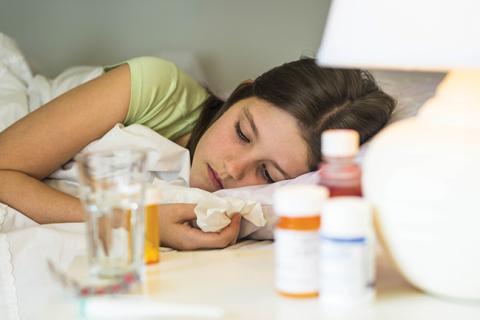 Girl sick with the flu