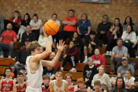 Photo by Hannah Styles/SMT Cooper Hyatt bounds above the opponents’ heads for an incredible shot against Andrews.