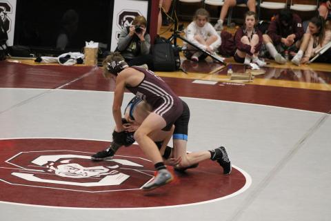 Owen Craig takes down an opponent from Enka Jets at the Devils Duals.