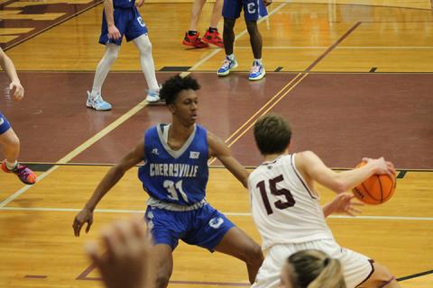 Cooper Hyatt darts back and forth to avert a Cherryville player