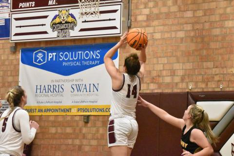 Photo by Joanna McMahan Lady Devils Savana Smith scores in the home game last week against Murphy. 