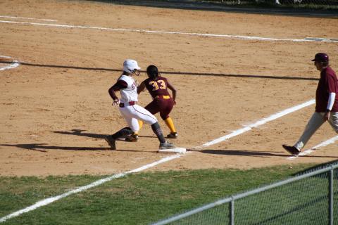Haileigh Woodard sprints to third base. She had two hits and two runs for the game against Cherokee.