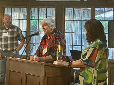 Jean Davis accepts the Duke Energy Service and Citizenship Award in memory of her husband Mack Davis