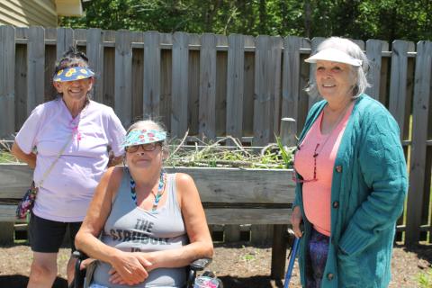 From left, Bryson Senior Living residents Judy Bird, Deb Eng and Carolyn Queen, along with Rina Terry, asked for the garden and quickly got to work making it a reality, planting seedlings and watering the beds. 
