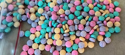 This image from the U.S. Drug Enforcement Agency show rainbow fentanyl that's been pressed into multi-colored pills.