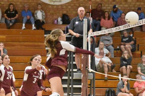 Lady Devil Kinsley Hyatt spikes the ball during the 3-0 win against Nantahala. 