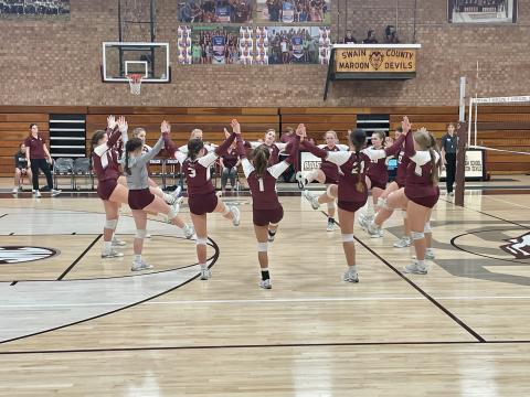 The Lady Devils getting pumped up before the game with Robbinsville on Tuesday. Rivalry was in the air as Swain and Robbinsville’s student section stayed loud for their teams the entire match.