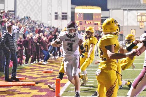 Joshua Collins advances the ball