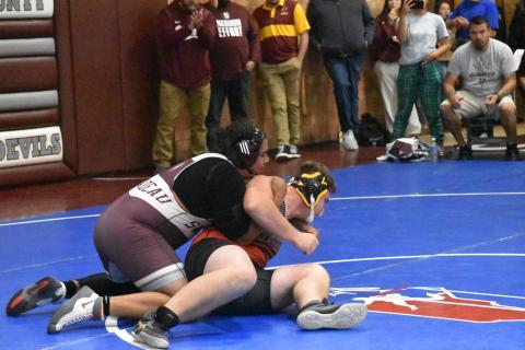Tyce Neadeau wrestles at the Maroon Devil Invitational on Nov. 19. Swain’s next wrestling match will be this Friday at Fannin County. Photo by Joanna McMahan/Swain Schools