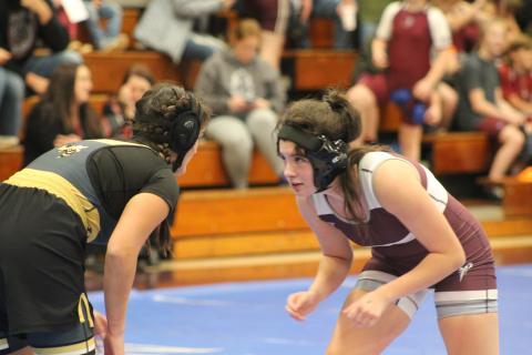 Lady Devil Brianna Wesley faces off against a Hayesville Yellow Jacket. Swain’s girls won their match with Hayesville 60-12.