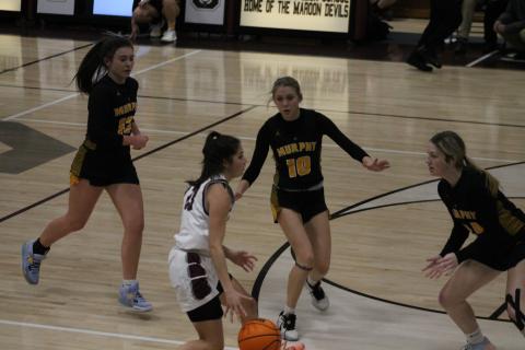 Lady Devil Marlee Hicks got an impressive buzzer beater shot from half court in the final second of the 1st quarter.