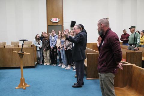 Superintendent Mark Sale introduces a host of Swain County High runners and wrestlers, all of whom have recently done well at championship events, before the April 4 County Commission workshop.