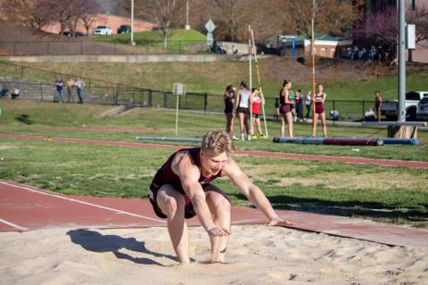 Josh Collins competes in triple jump at the WCU meet.
