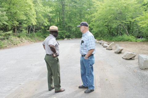 Superintendent Cassius Cash (from left) and Coach Bob Marr at the new parking area at Deep Creek, will open over Memorial Day weekend.