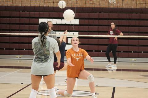 The Lady Devils volleyball team has been practicing hard as the upcoming season grows closer, according to coach Lydia Sale. They meet daily in the high school gym, where they spread out in pairs and practice lobbing the ball back and forth.
