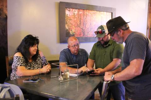 Paula and Jeff Fuller (from left), owners of Pursenality and Boxcar Café and Cones, attended a small town meeting with engineer Nate Bowe and Mayor Tom Sutton on Tuesday, Aug. 1 to talk about the utilities work going on.