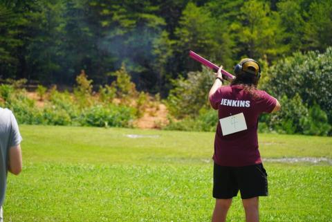 Swain competes in shooting