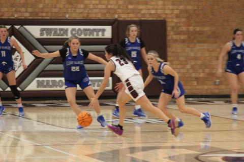 Sophomore Marlee Hicks prepares to shoot the ball at the game Tuesday, Dec. 5.