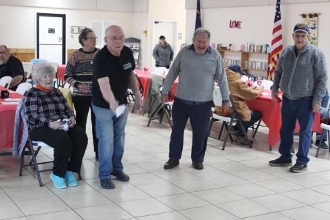 From left, Pam Dengler, Margaret McCarty, John Crisp, Bruce Billstein and Harold Parton play a rousing game of a variety of cornhole as part of the weekly group activities class held Monday mornings at the Swain County Center and led by Shannon Royce of TOA Bryson City