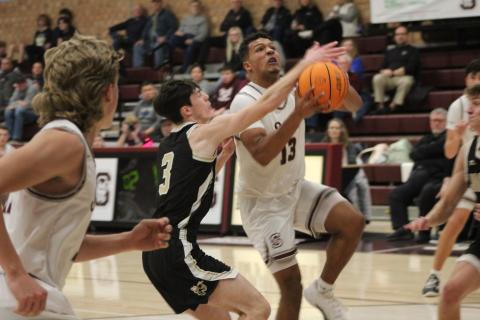 Senior Josiah Glaspie gets ready for a layup in the home win against the Yellow Jackets on Tuesday night.