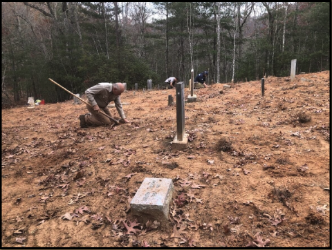 Henry Chambers with North Shore Cemetery Association is pictured at a workday at Fairview Cemetery last year. 