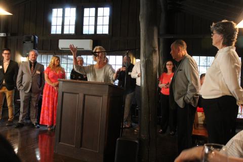 Sue Brown, co-owner operator of The Fryemont Inn, speaks to the crowd after she and her husband George were awarded the Duke Energy Service & Citizenship Award.