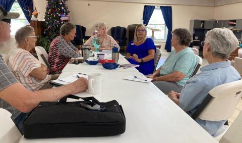 Tammy Williams and Ginger Frady with United Community Bank in Bryson City, speak at Swain Senior Center conducting a program on senior fraud
