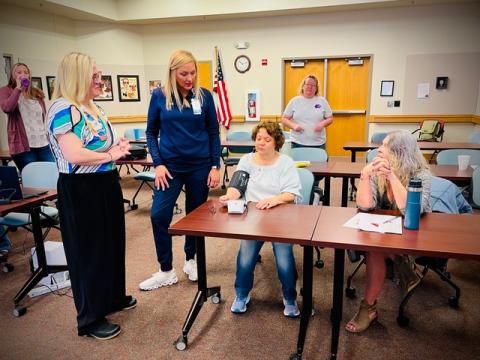 Amanda Pack and Cara Smith of Angel Medical Center trained Fontana Regional Library staff to help patrons to check out and use Libraries with Heart blood pressure monitoring kits.