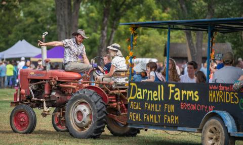 Darnell Farms, led by Nate Darnell (left) and sister Afton Roberts, is the recipient of the organizational Mountain Heritage Day award.