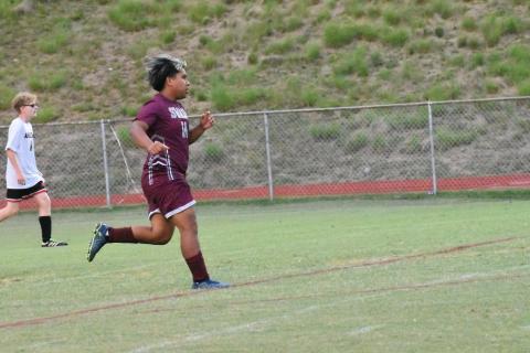 Swain’s Abraham Pena keeps the momentum going for the Devils after scoring a field goal.