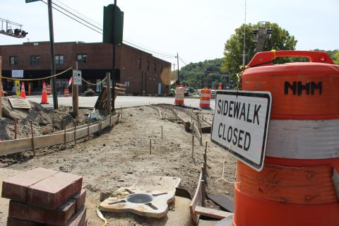 The sidewalk in front of the depot is closed