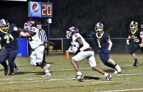 Maroon Devil Zeke Glaspie, junior, eyes the end zone in the away game against the Bulldogs.