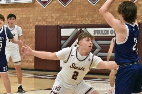 Maroon Devil Rowan Ellis, senior, guards a Bear in the home win last Wednesday.