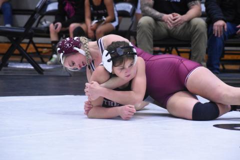 Lady Devil Elaynah Cogdill has a good hold on her competitor.