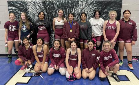 Lady Devil wrestlers are pictured after competing at Parkwood High.