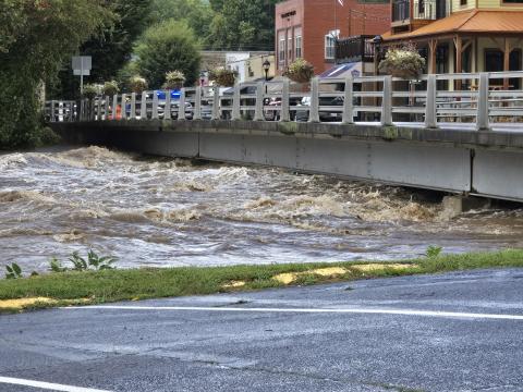 Pictured is Everett Street bridge and the raging waters of the Tuckasegee River during Hurricane Helene. 