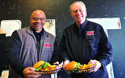 SMT photo /Sara Eisinger.  Wize Guyz Grille Owner Thomas Bynum (left to right) and Director of Operations Bill Hamilton at its new Bryson City location on Monday. The restaurant can seat 102 people and 60 more in its outdoor patio. 