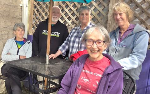 SMT Photo/Sara Eisinger.  Elizabeth “Bunny” Johns (front); (back, left to right) Jude Hammond, Drew Hammond, Sherry Spurlin and Janet Smith enjoy coffee and brunch at Mountain Perks Espresso Bar & Café on Sunday, March 9. They each had their own stories to tell about Nantahala Outdoor Center in the 1970s.
